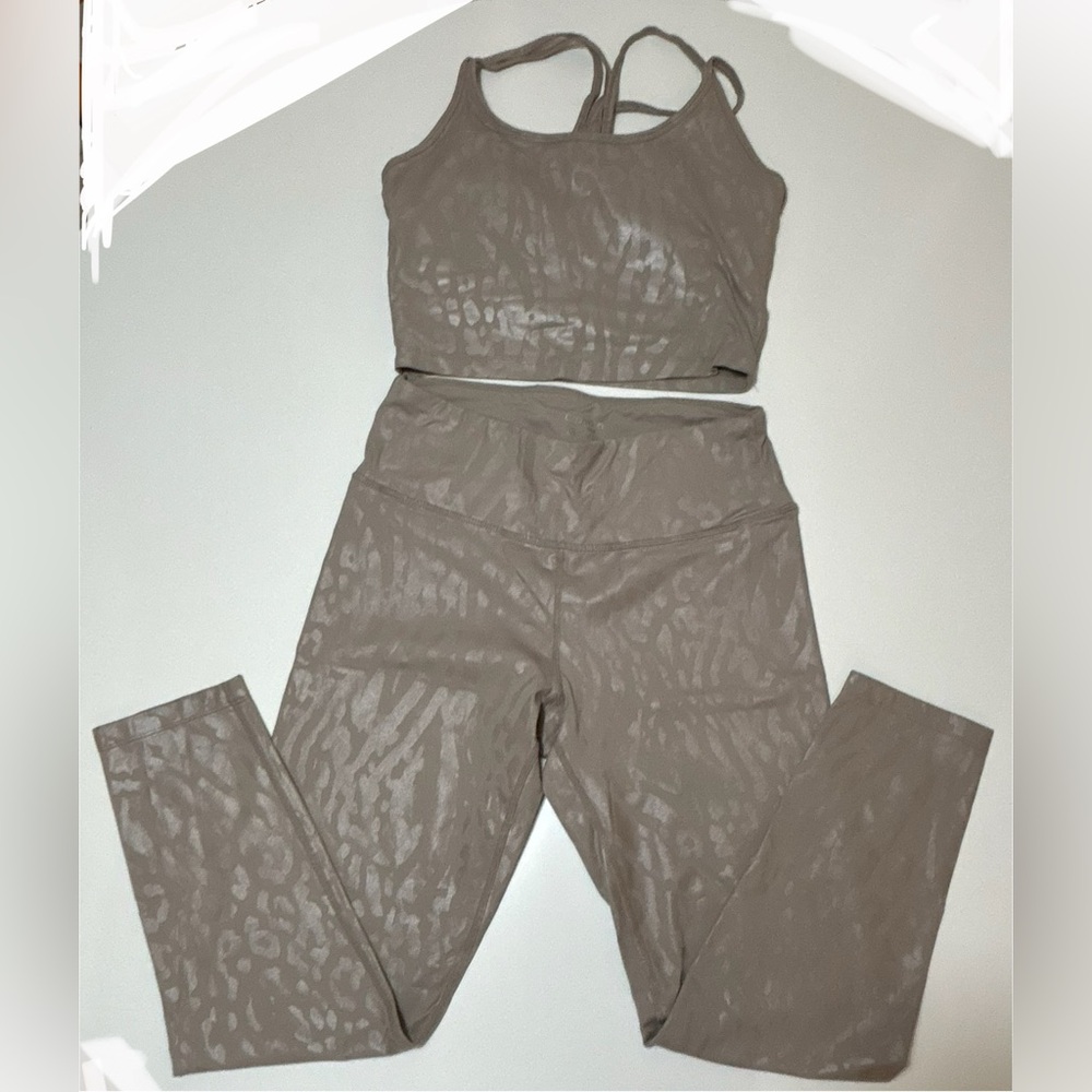 Calvin Klein Leggings & Strappy Crop Tank. I never wore it, it’s brand new